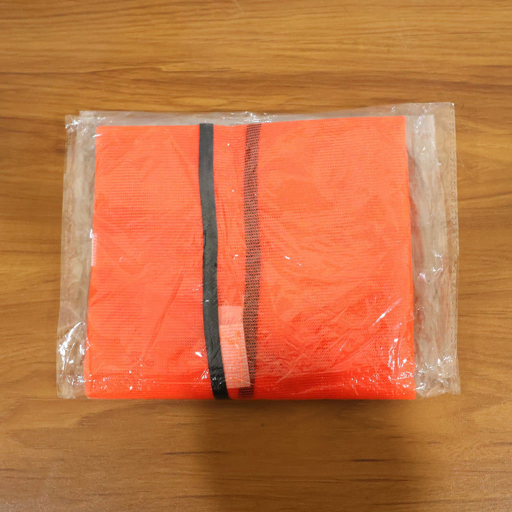 Detailed view of the reflective strips on the Orange Safety Jacket, ensuring maximum nighttime visibility.
