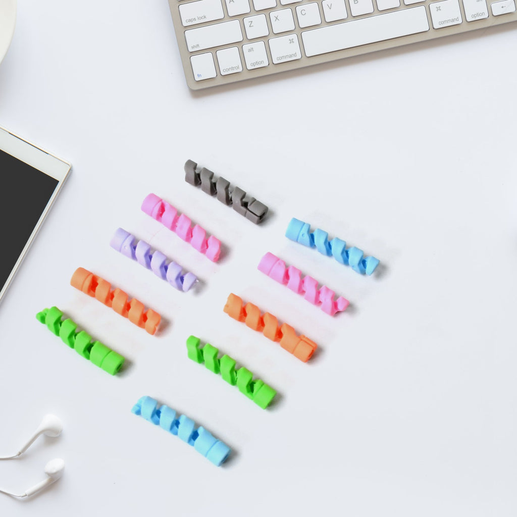 Flexible cable protector wrapped around a white earphone cable.