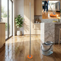 Spin mop with round microfiber head and bucket system for floor cleaning