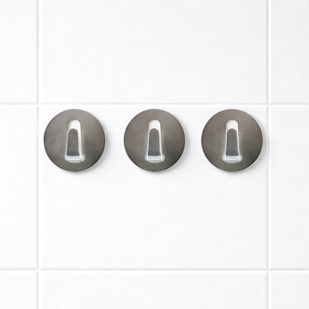 Set of reusable stainless steel hooks with a shiny silver finish.