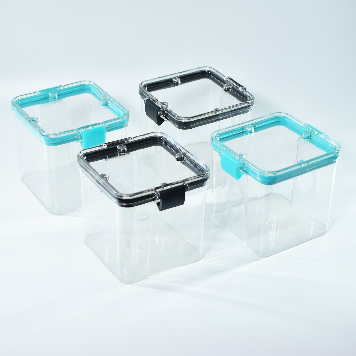 A set of four 700ml plastic food storage containers, perfect for storing dry goods.