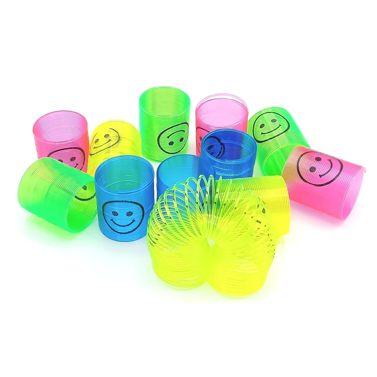 A hand holding a bright multicolor slinky spring toy, demonstrating its stretch.