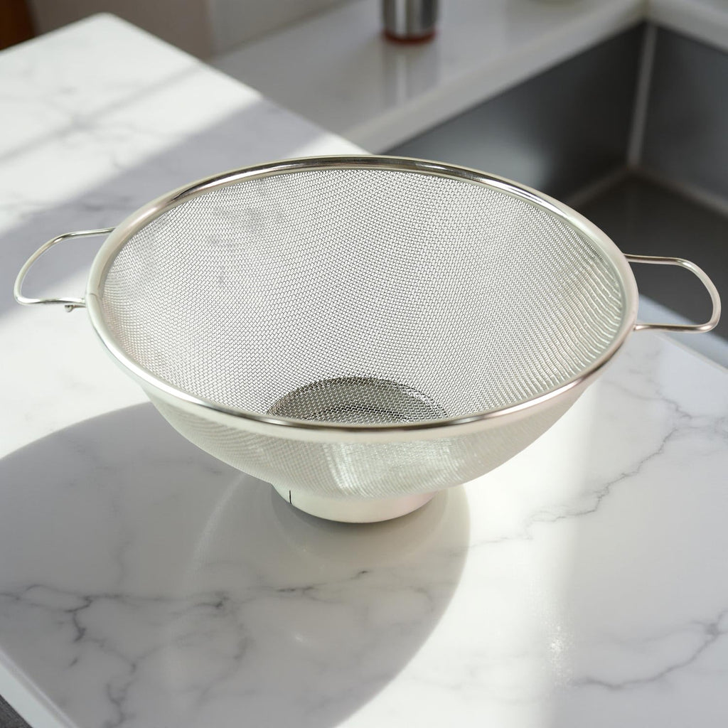 Dual ergonomic welded handles on stainless steel colander for easy grip