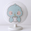 Cartoon fabric mesh fan cover fitted on a pedestal fan