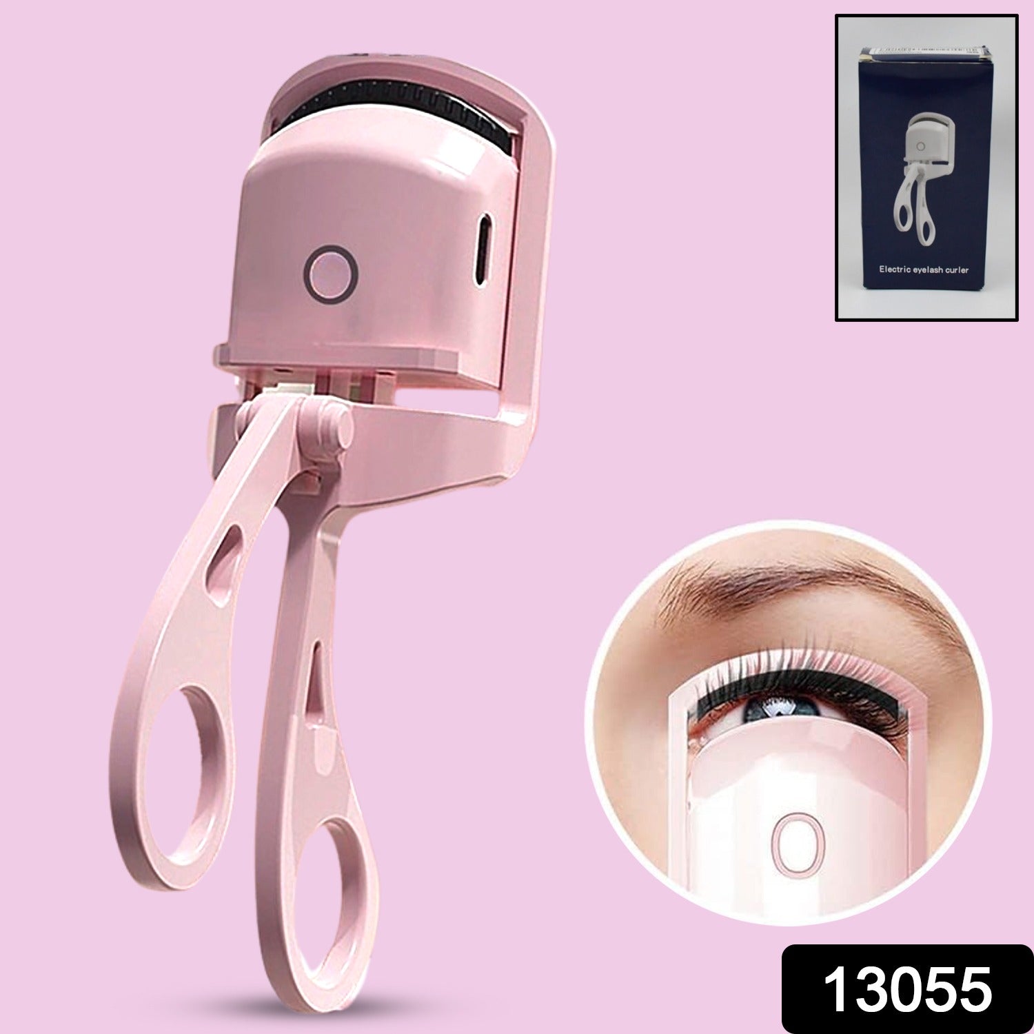 Close-up of the Electric Heated Eyelash Curler comfortably held in hand.