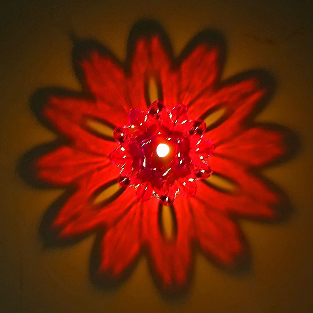 Overhead view of the 12-piece Diwali candle holders in various hues.