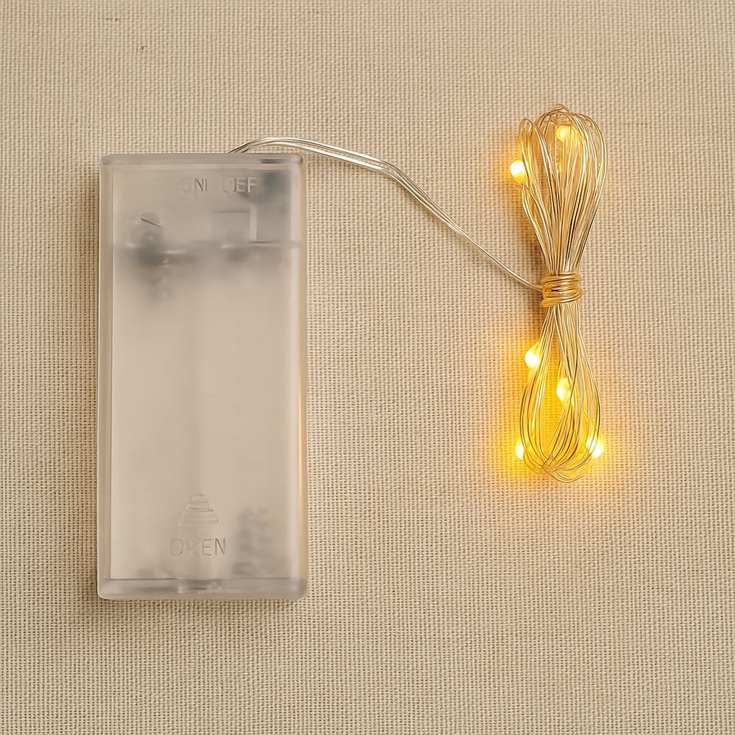 Copper wire string fairy lights with warm white 30 LED bulbs glowing beautifully.