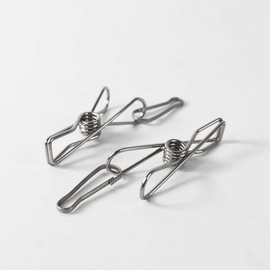 Durable stainless steel clothes pegs holding clothes securely