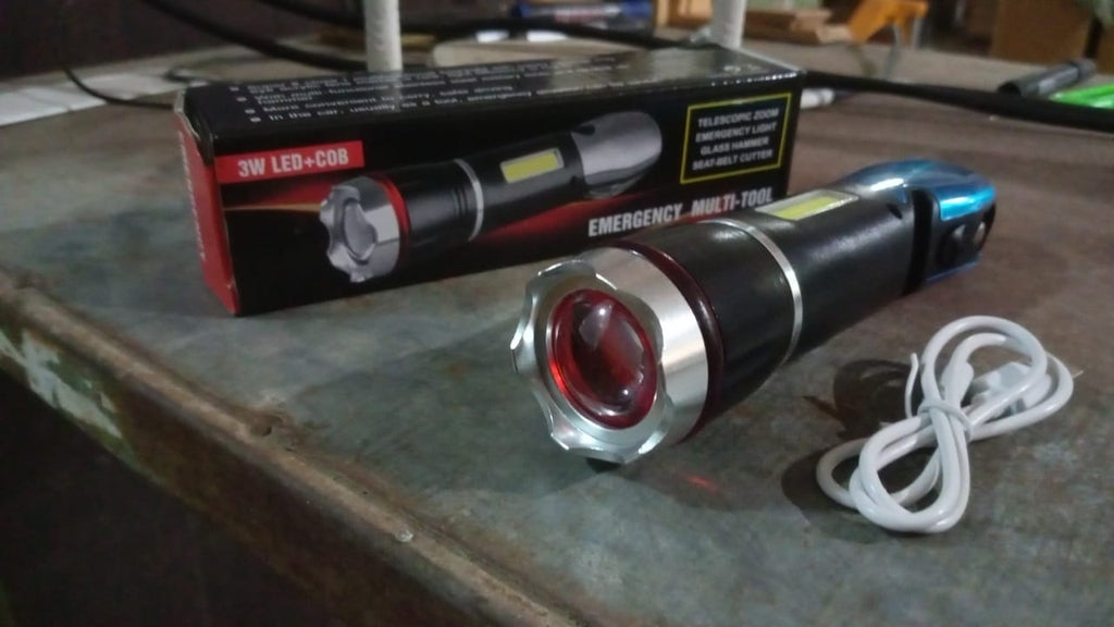 Detailed view of the multi-tool LED flashlight's zoomable light feature.