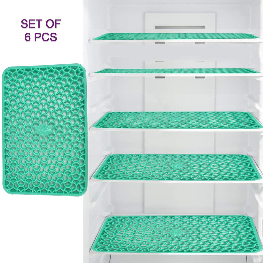 A set of fridge mats designed for hassle-free cleaning.