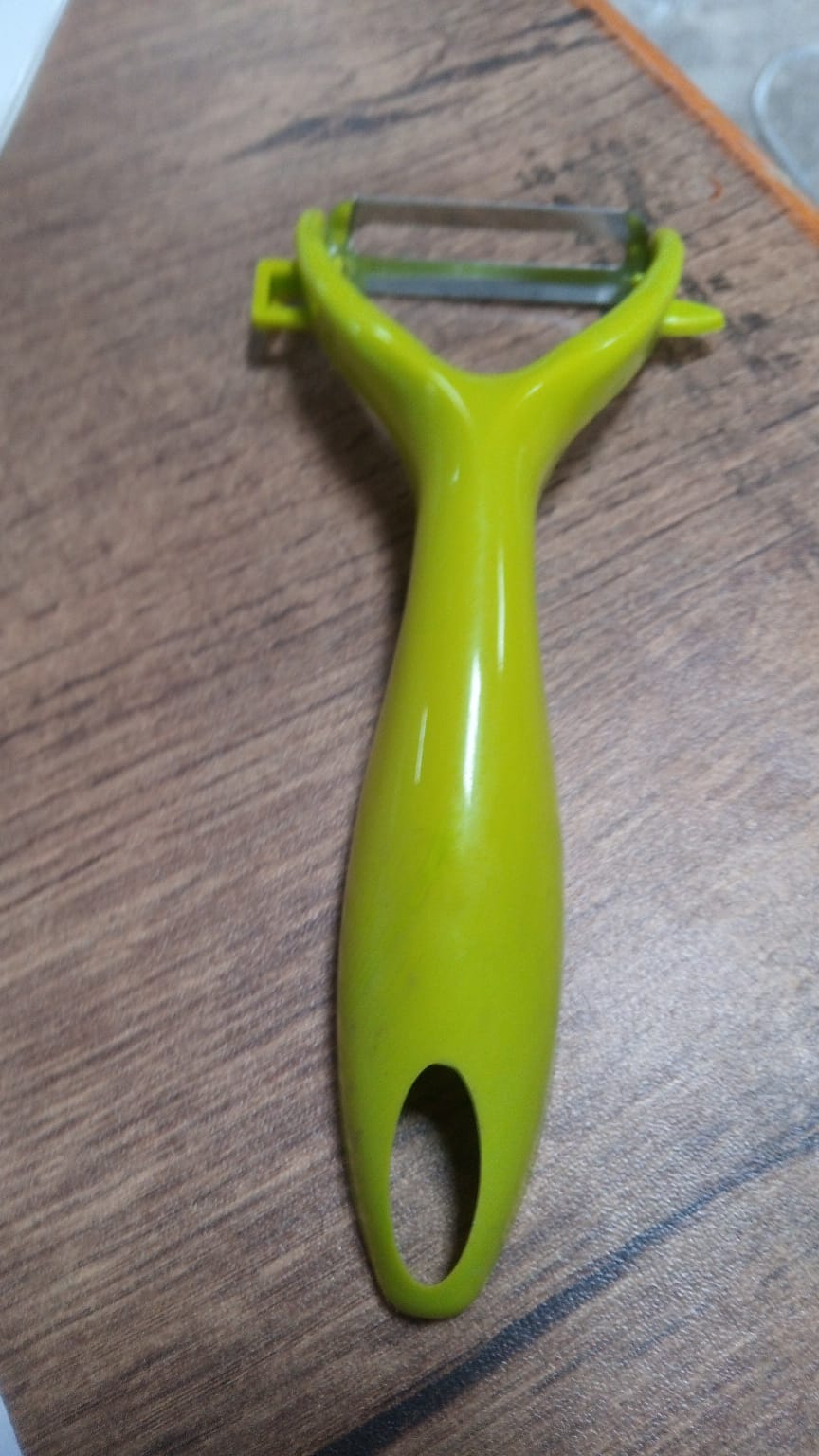 Sturdy stainless steel fruit and vegetable peeler, an essential kitchen tool for every home.