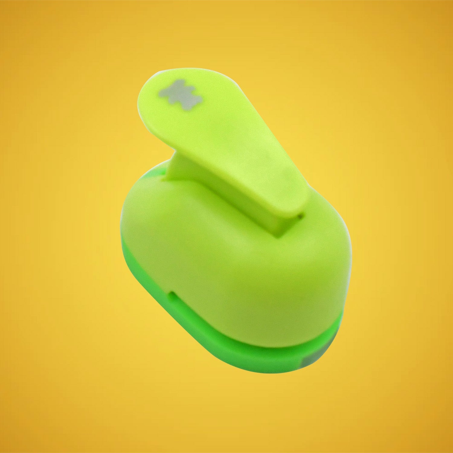 Colorful paper craft punches for kids arranged neatly on a white background.