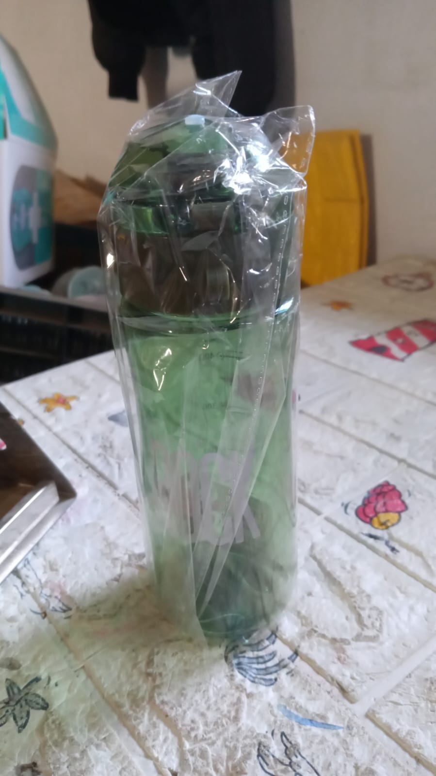 BPA-free plastic water bottle with carry case, ideal for outdoor travel.