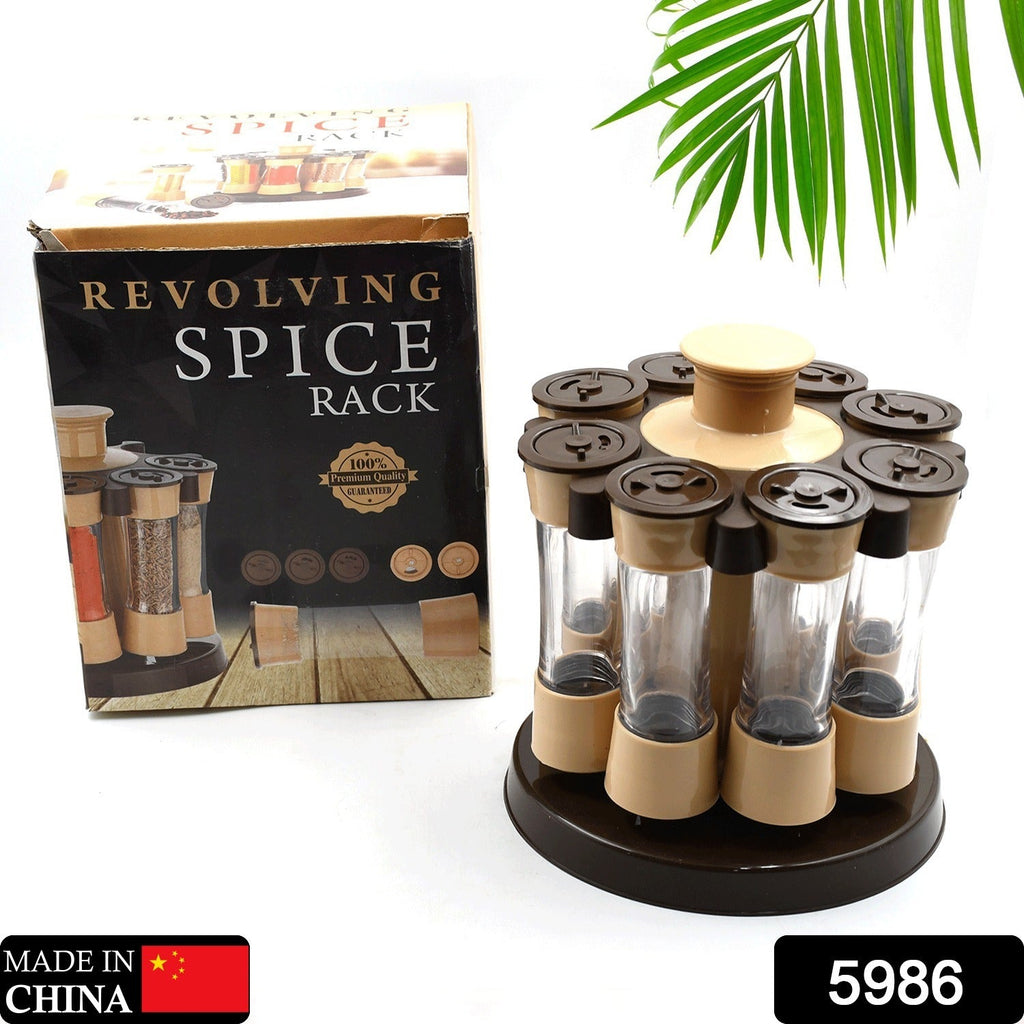 A hand selecting a spice jar from the 360-degree revolving spice rack, showcasing its ease of use.