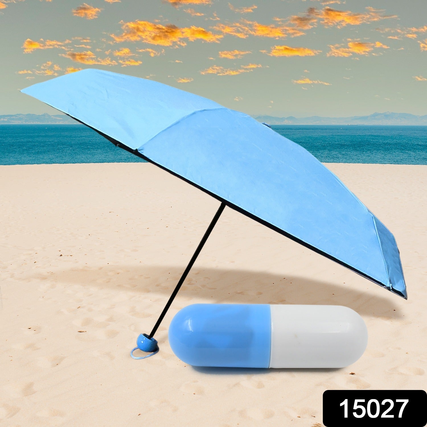 An open DrizzlePro compact umbrella providing ample rain protection in a city environment.