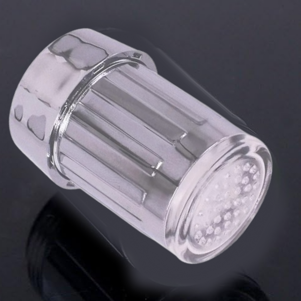 Luminous LED faucet tap adapter glowing brightly on water stream