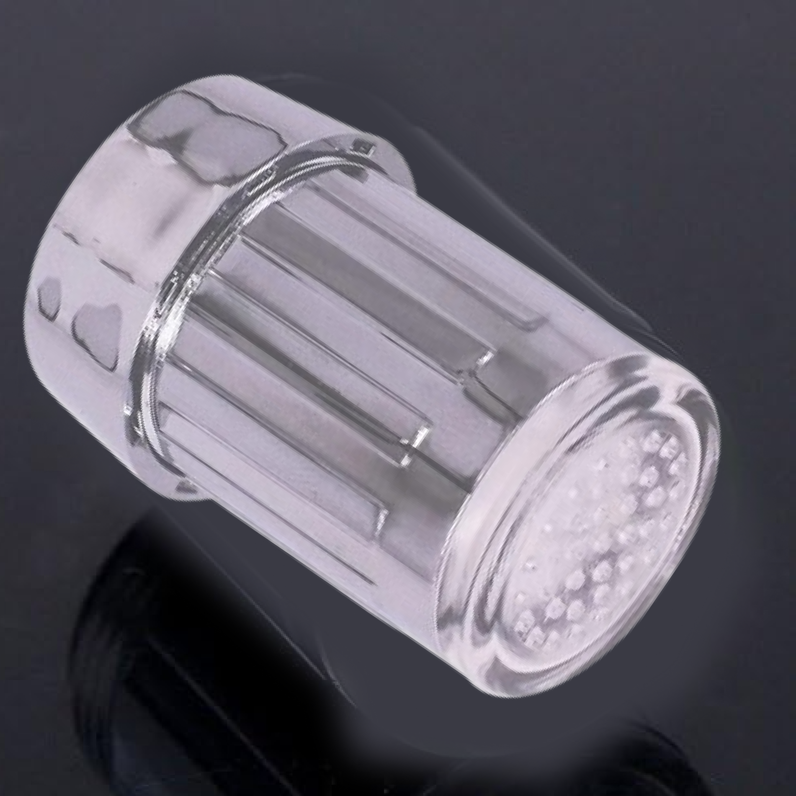 Luminous LED faucet tap adapter glowing brightly on water stream