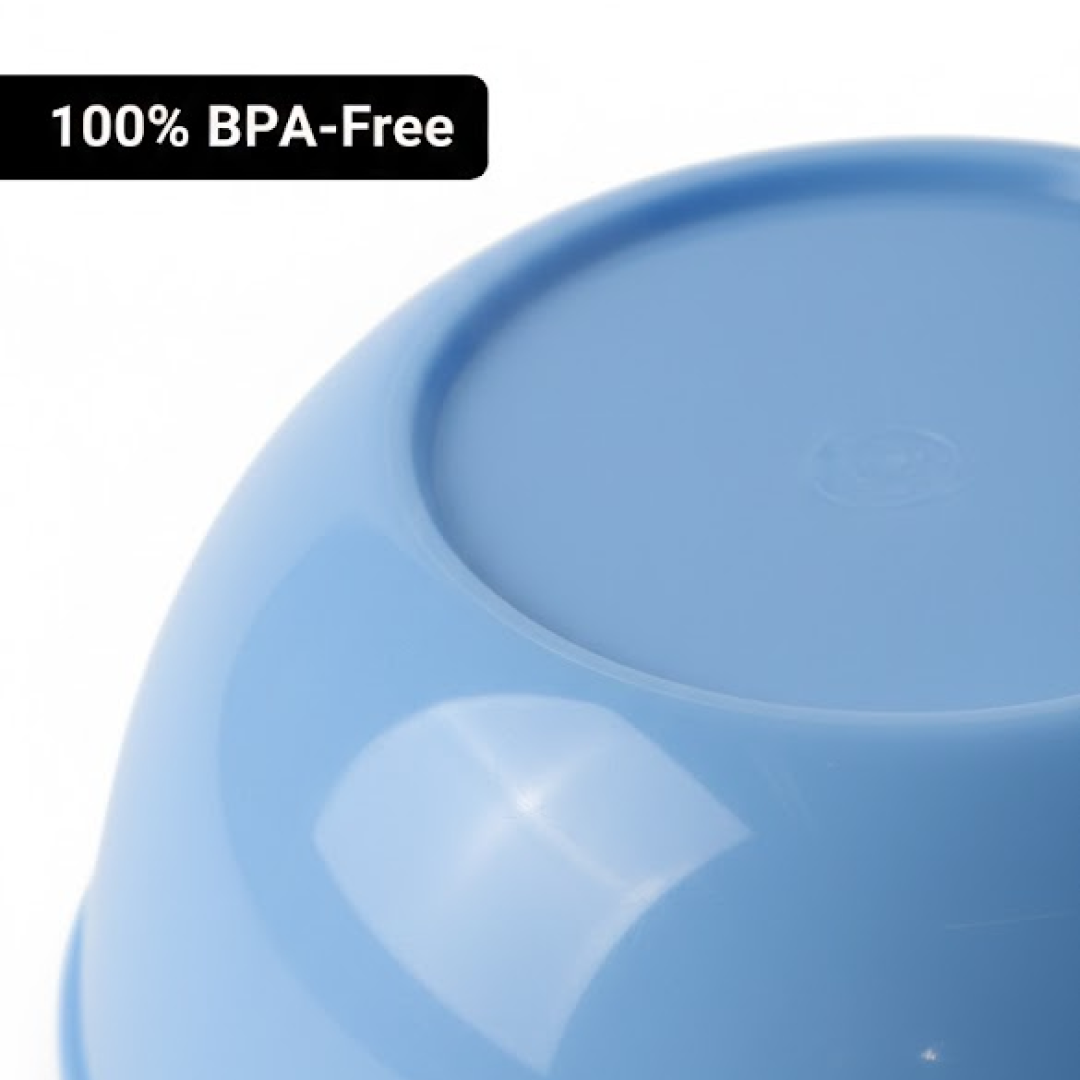 A hand holding a lightweight, unbreakable plastic bowl, perfect for kids or outdoor use.