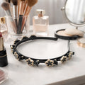 Elegant floral embellished headband with a stylish floral design for women and girls