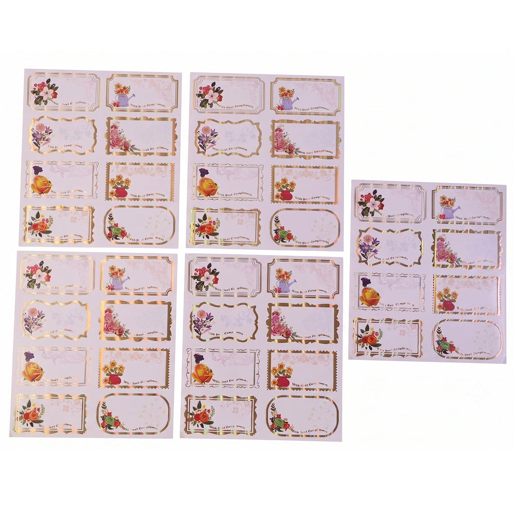 White gift tag stickers with floral gold foil accents on gift box