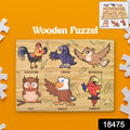 Child's hands playing with the vibrant Wooden Bird Puzzle, developing fine motor skills.