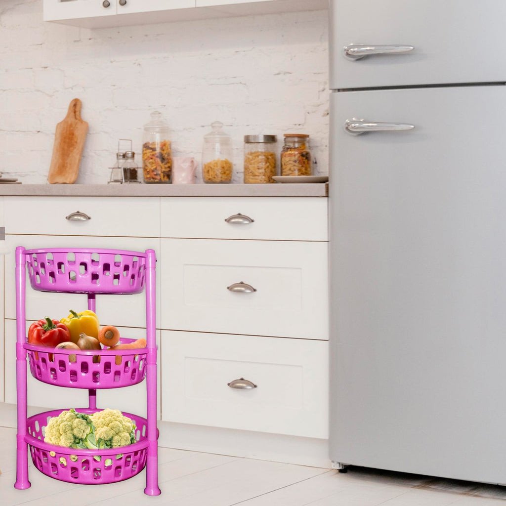 Organivo 3-tier plastic storage rack in a kitchen setting, holding fruits and vegetables.
