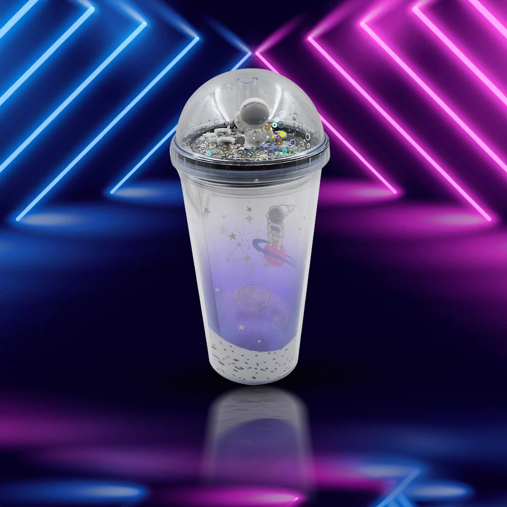 The double-wall plastic astronaut tumbler with its LED light on, displayed against a plain background.