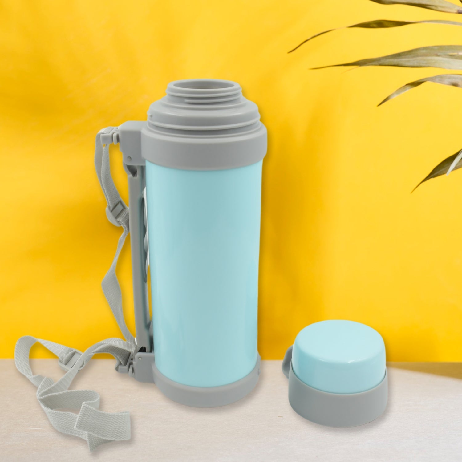 Side view of the portable vacuum bottle with its retractable handle.
