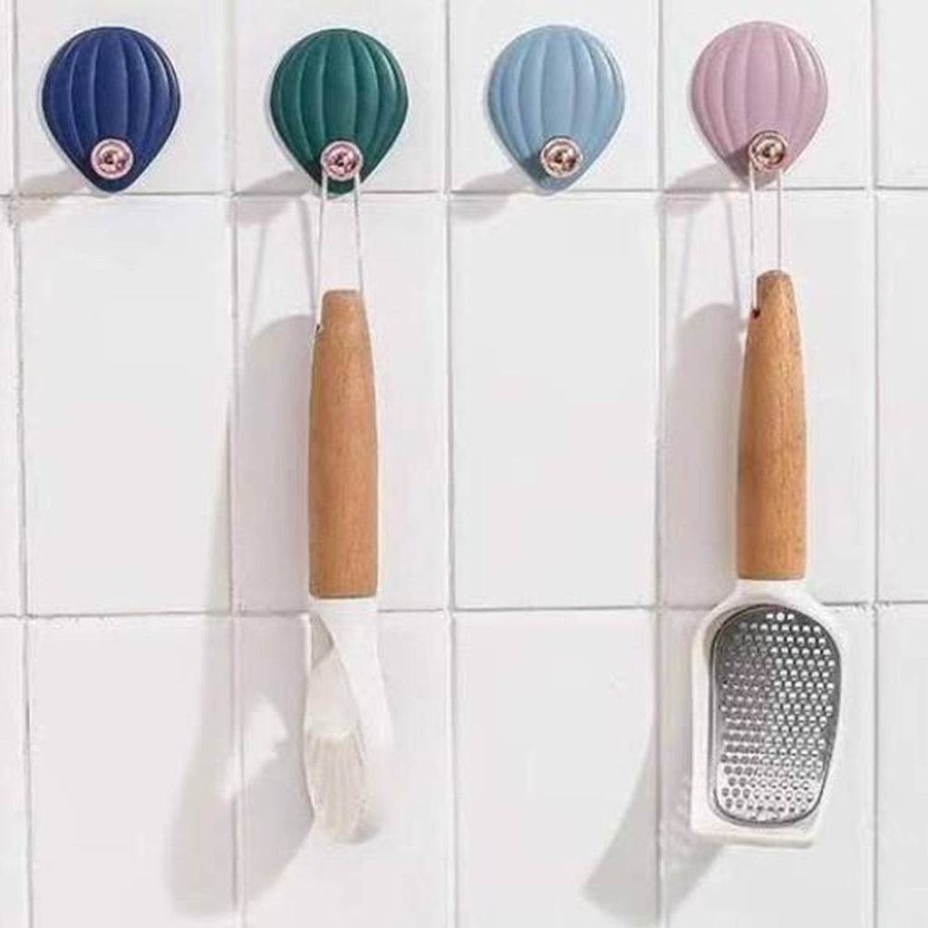 Multipurpose colorful self adhesive hooks displayed in pack