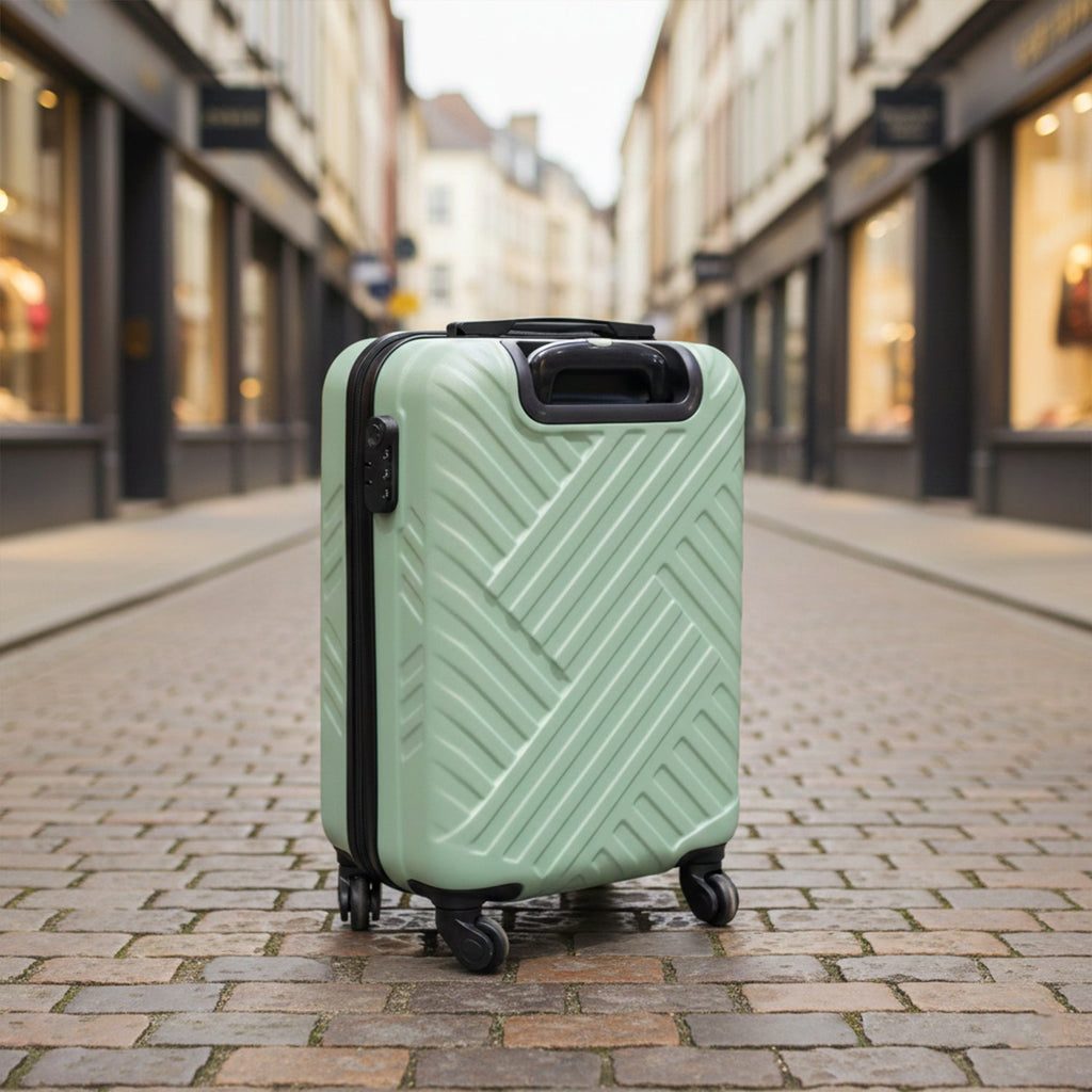 Side view of a durable and lightweight ABS luggage piece with strong zippers.