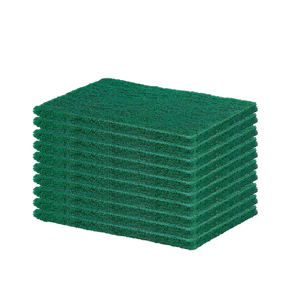 A hand holding a green scrubber pad, demonstrating its flexible and ergonomic design.