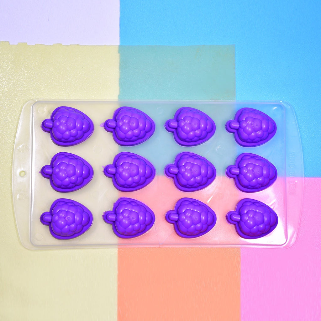 Side view of the easy-to-use silicone fruit ice cube tray.