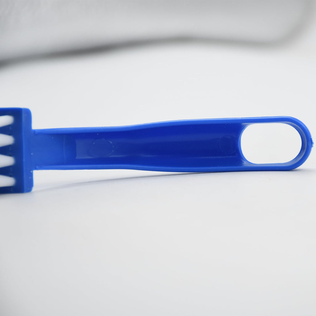Three distinct cleaning brushes for diverse kitchen tasks.