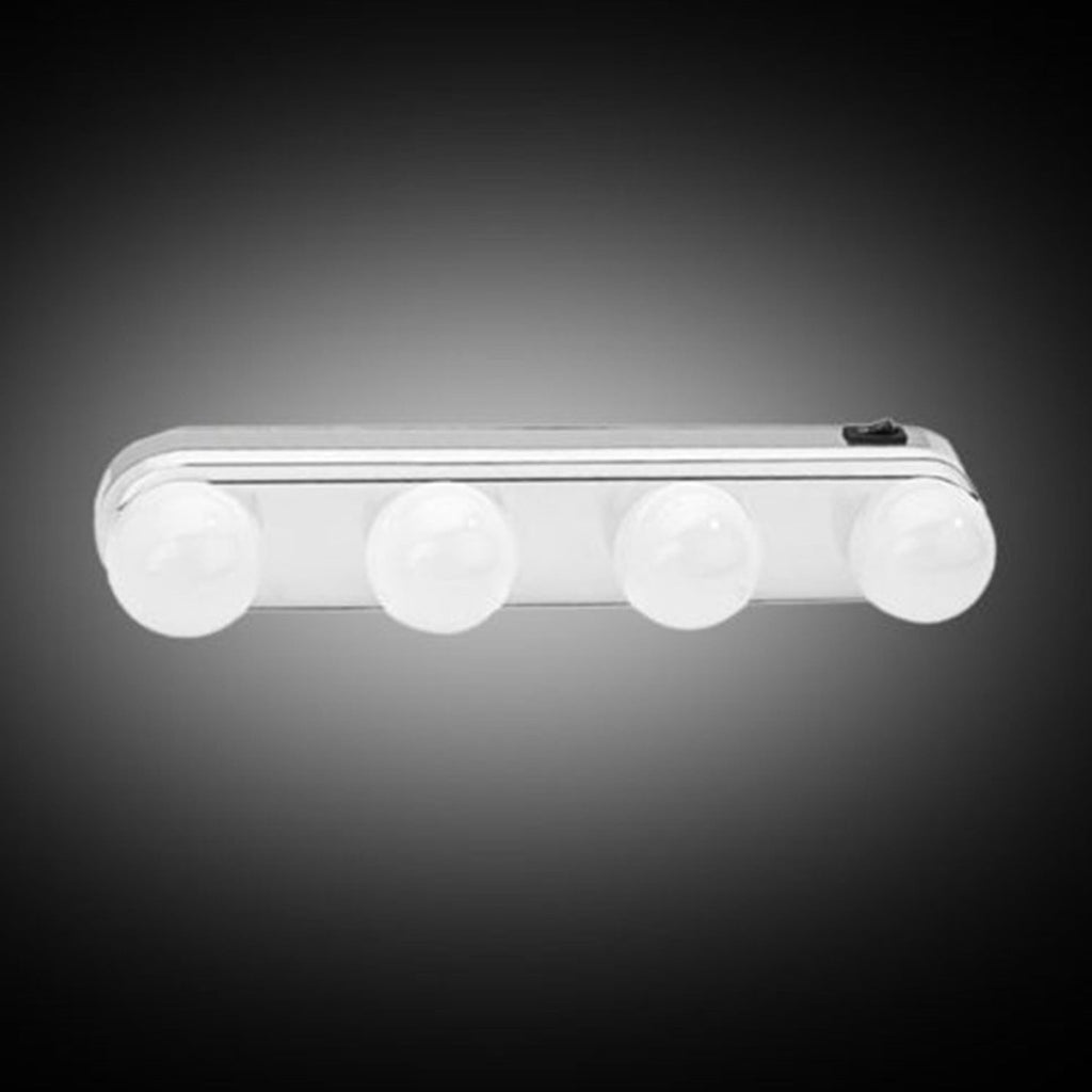 Compact LED vanity light attached to a mirror, showing even illumination.