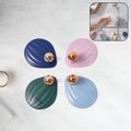 Set of four colorful self adhesive wall hooks for multipurpose use