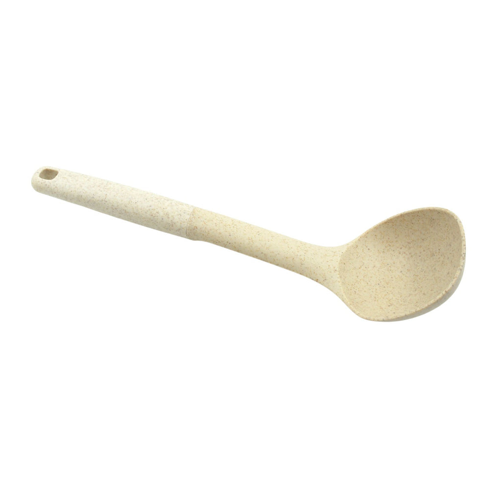 The durable plastic pasta fork displayed against a clean kitchen background, ready for use.
