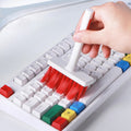 Dustiva 5-in-1 computer cleaning kit with various brushes and tools.