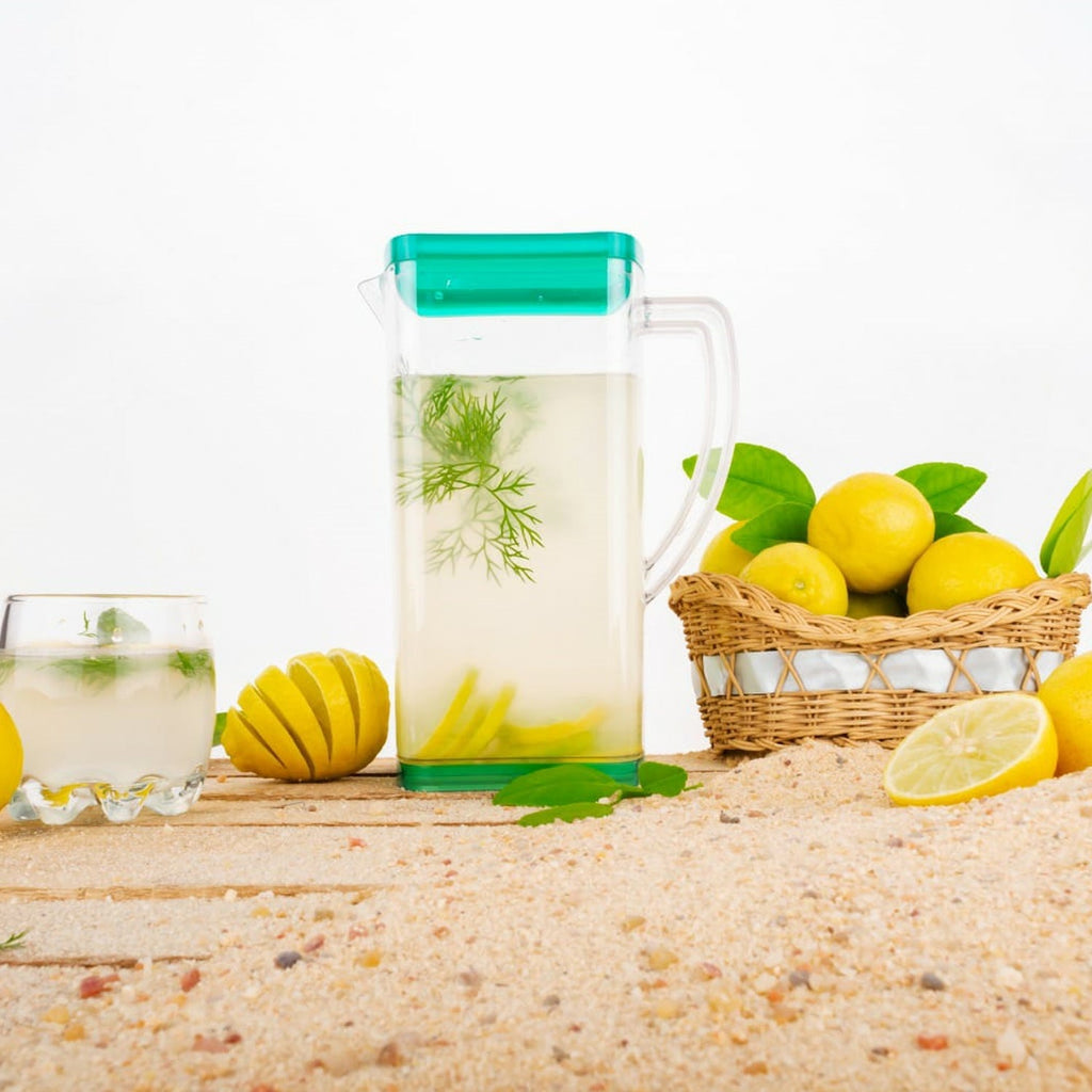 Clear plastic jug with six glasses, a practical choice for any Indian home.