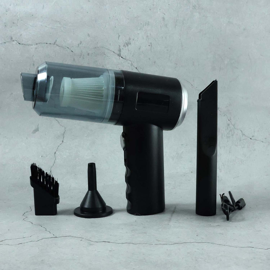 Close-up of the Mini Car Vacuum's nozzle and brush attachments.