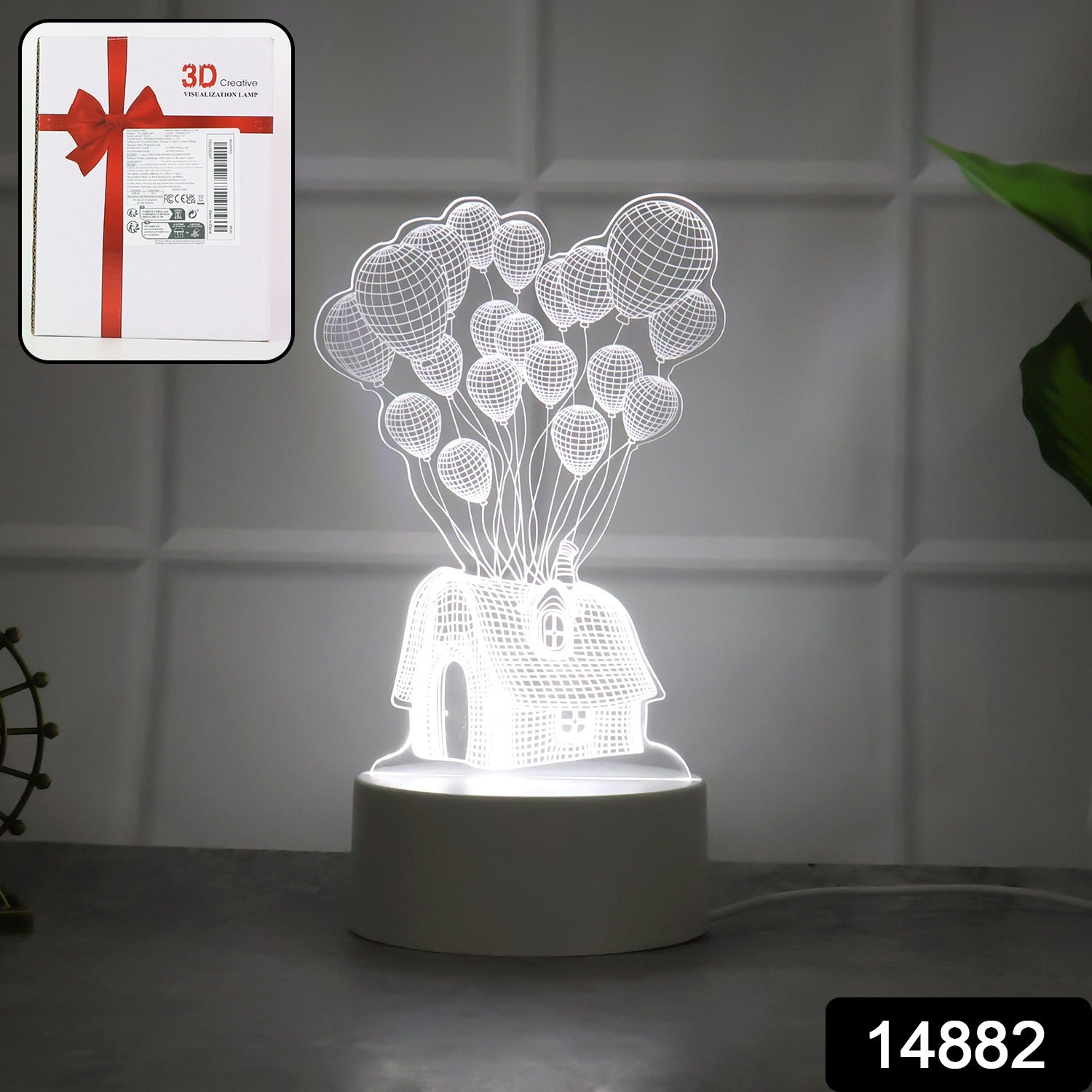 Close-up of 3D Illusion LED Night Lamp showing detailed house and balloons design