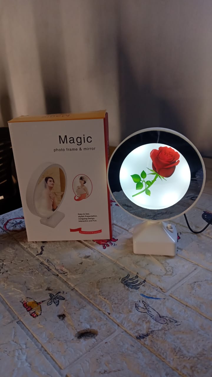Packaging for the Indo Glow LED Mirror Photo Frame, ready for gifting.