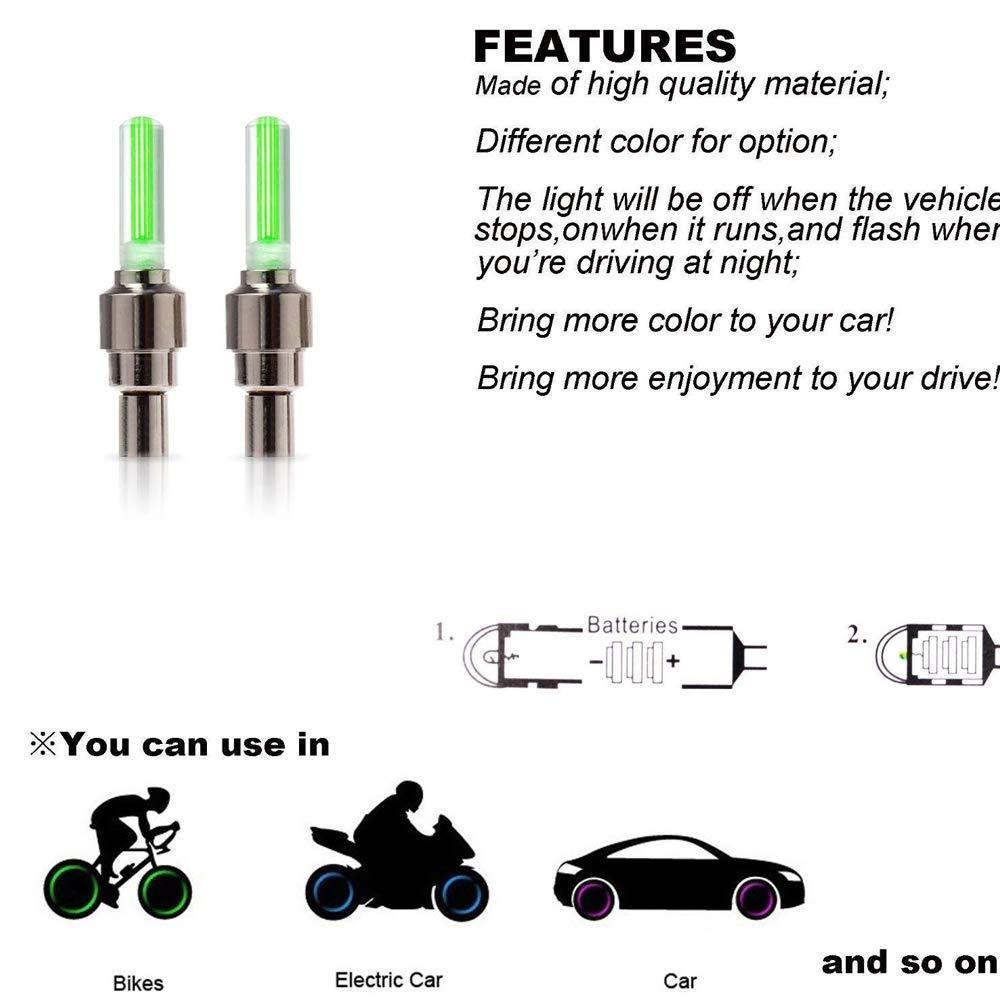 LED tyre valve caps creating a vibrant light trail on a bicycle wheel at night.