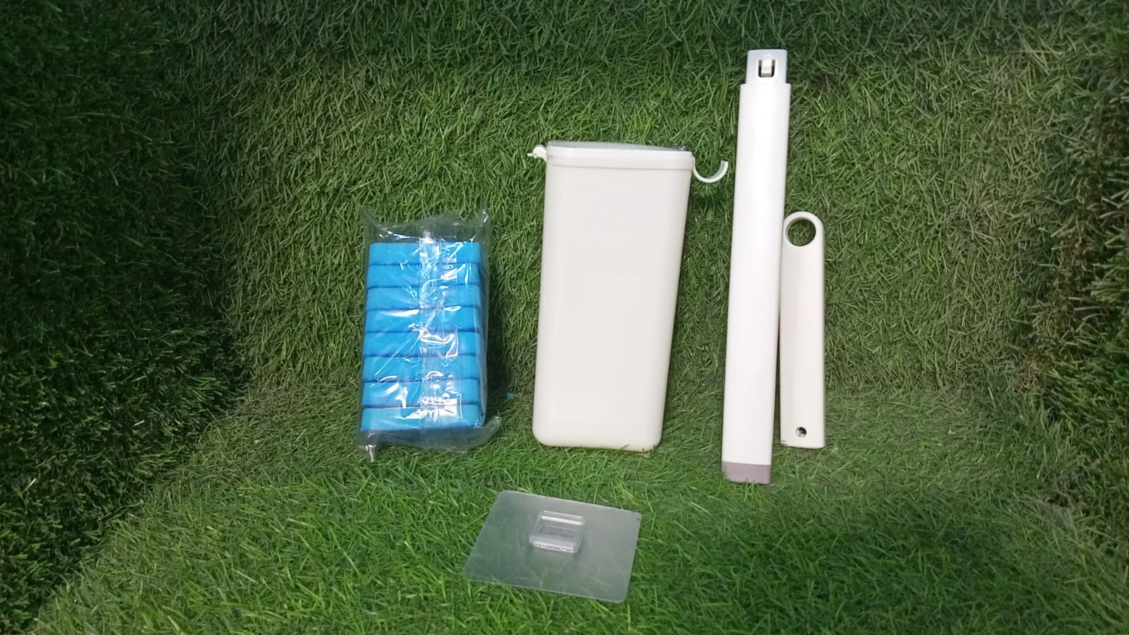 Hygienic toilet cleaning system with its space-saving storage caddy.