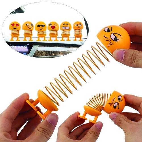 Multiple angles of the smiling face shaking head doll, highlighting its expressive features.