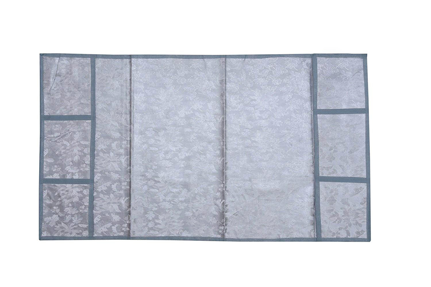 A Decorative Fridge Top Cover laid flat, highlighting its protective and aesthetic features.