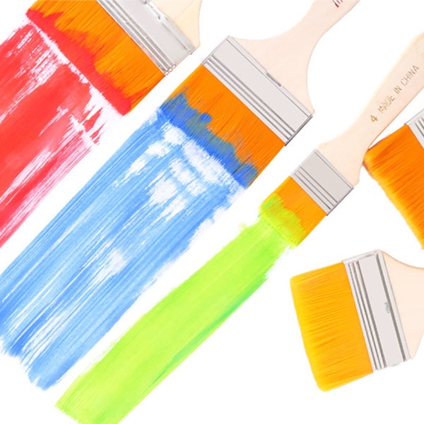 A flat paint brush being used to create a vibrant watercolor painting, demonstrating its smooth application.