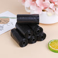 Large black garbage bags, 30 x 50 inch, for effective waste disposal.