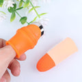 Close-up of the ergonomic vegetable thumb cutter on a hand.