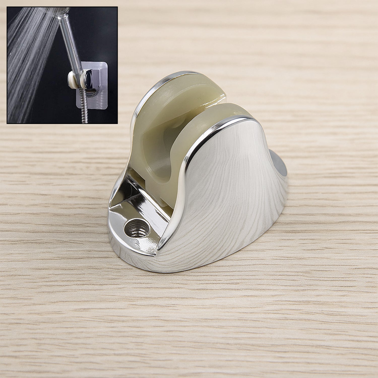 Adjustable hand shower holder with fixing screws in a modern bathroom.
