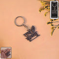 Radhe Krishna Metal Keychain featuring peacock feather design on premium metal alloy